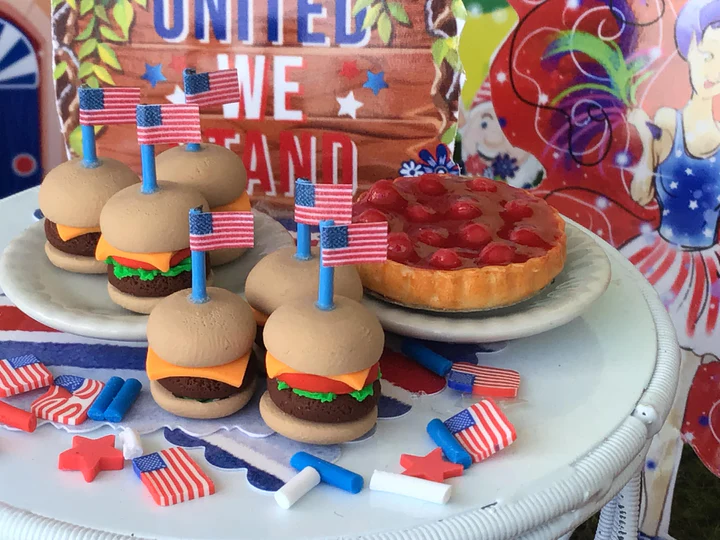 your choice of hamburgers with all the works or a plain cheeseburger