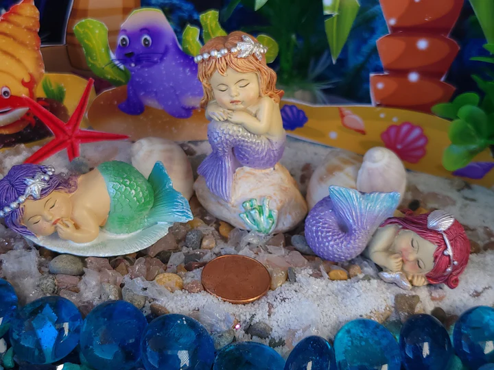 adorable sleeping little mermaids